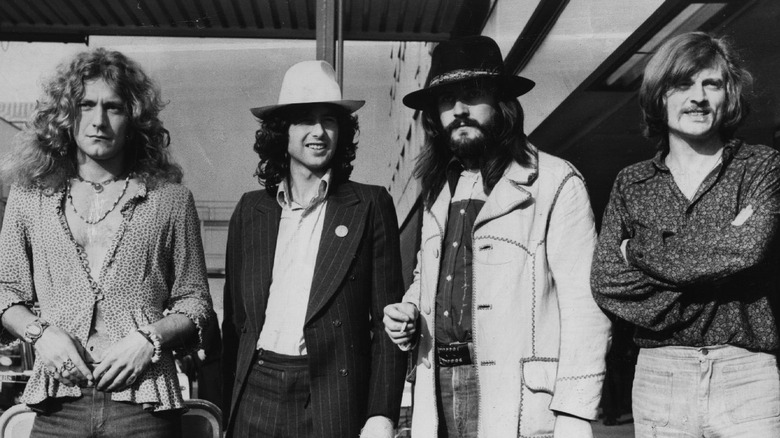 Led Zeppelin standing together