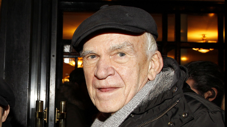 Milan Kundera in flat cap