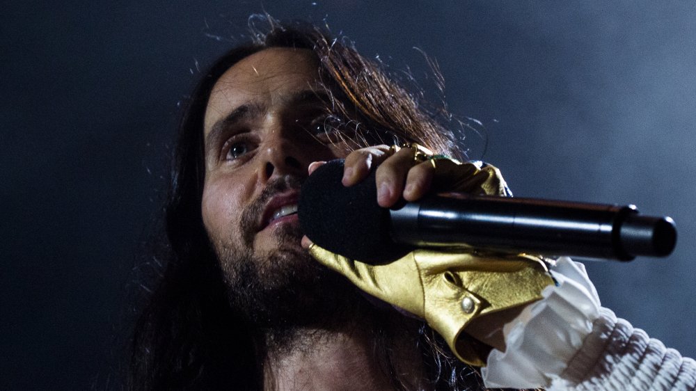 A photo of Jared Leto singing