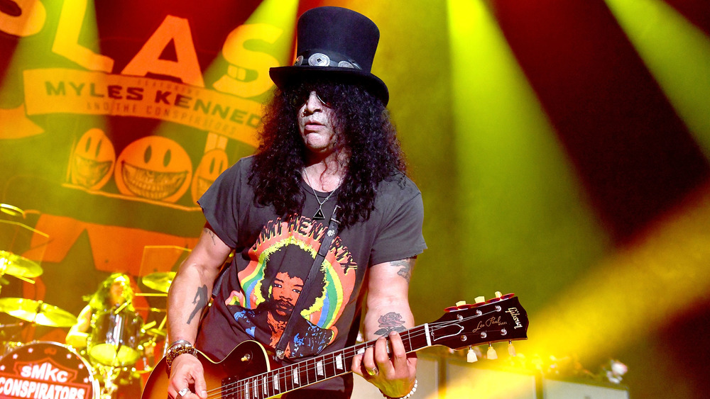 Slash playing guitar