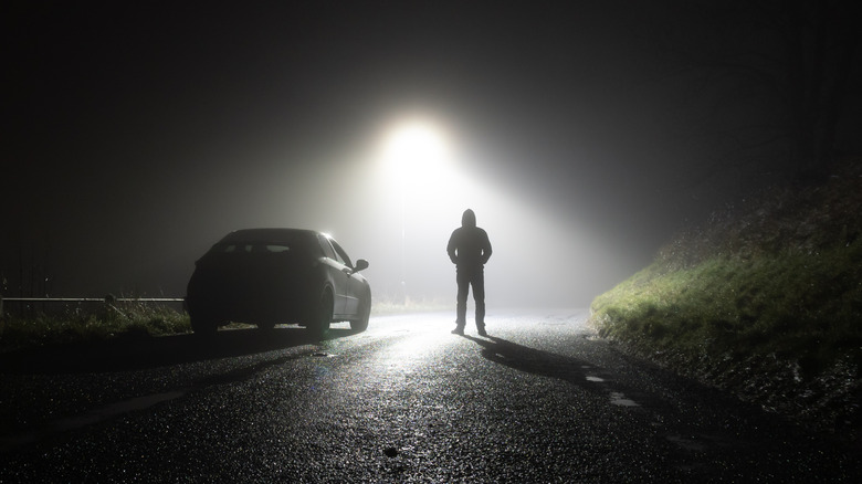 highway with silhouetted man