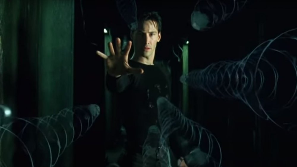 Keanu Reeves as Neo in the 1999's The Matrix