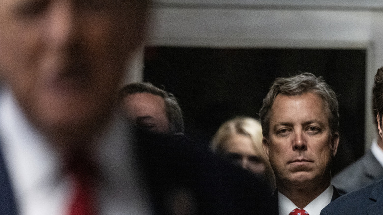 Rep. Andy Ogles with Donald Trump in foreground