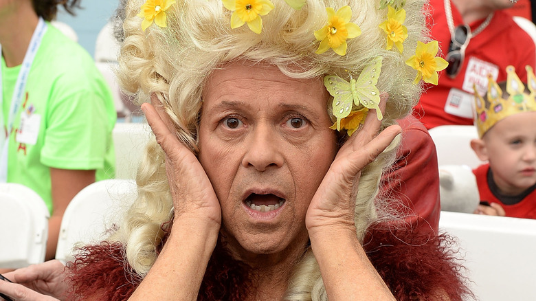 Richard Simmons in flower headdress