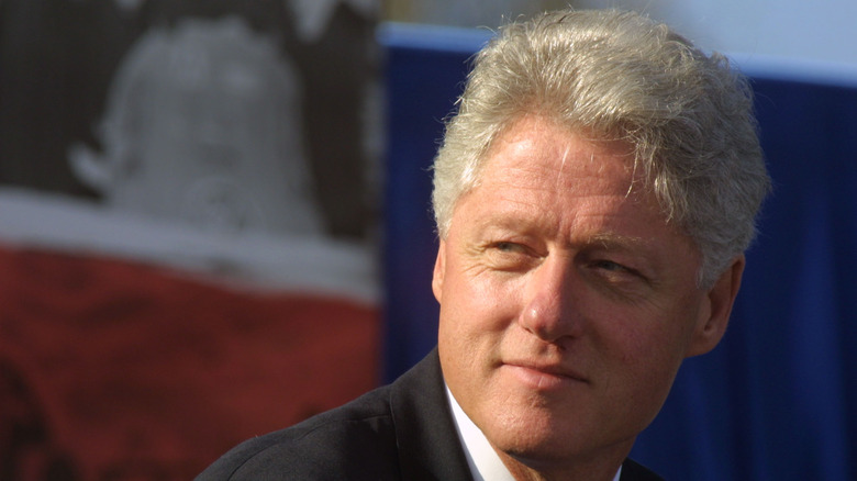 Bill Clinton looking over shoulder