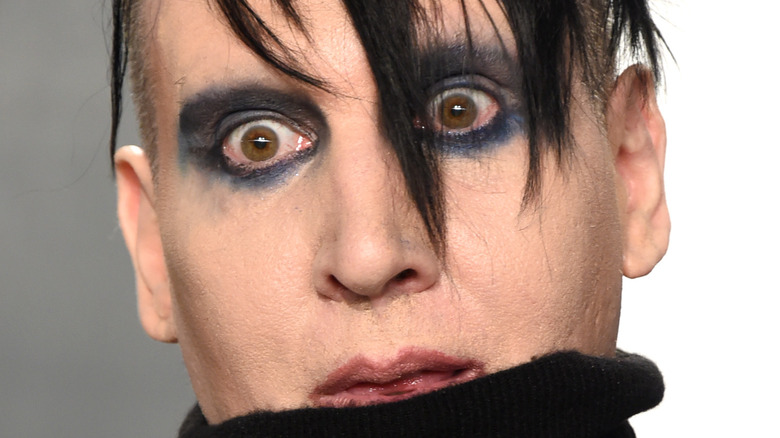 marilyn manson in turtleneck and makeup
