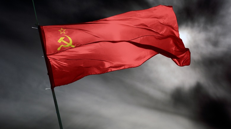 Soviet flag flying grey background