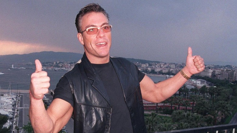 Jean-Claude Van Damme showing two thumbs up