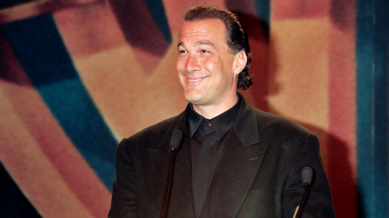 Steven Seagal smiling in black tux