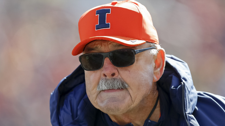 Dick Butkus sunglasses orange hat