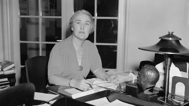 Missy LeHand at work, with a bust of Franklin Roosevelt on her desk