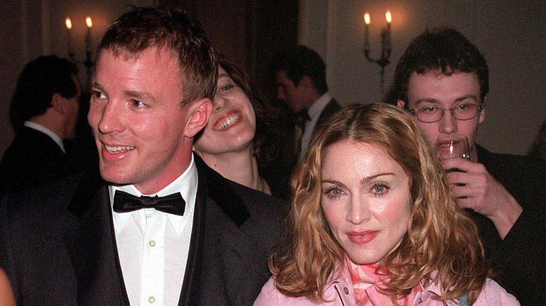 Guy Richie and Madonna at party