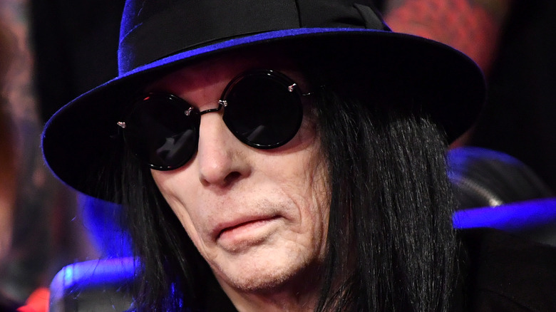 Mick Mars wearing sunglasses