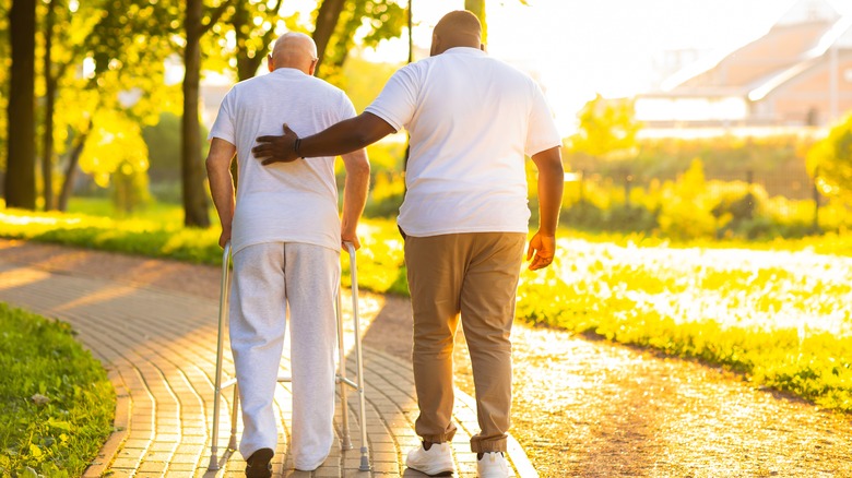 Helping a person using a walker