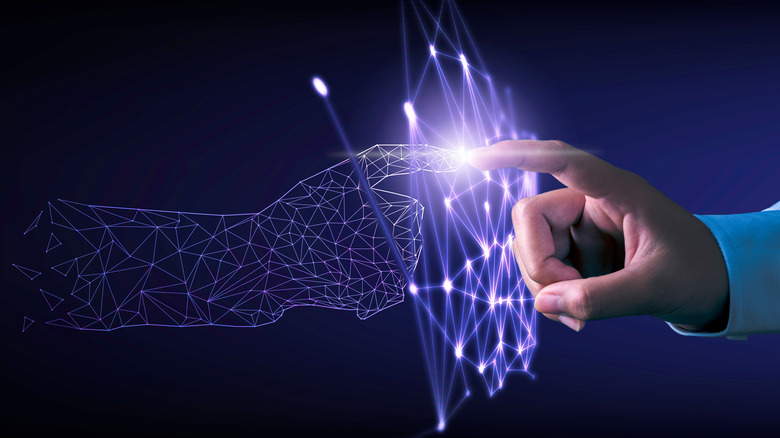 Human hand and computer hand