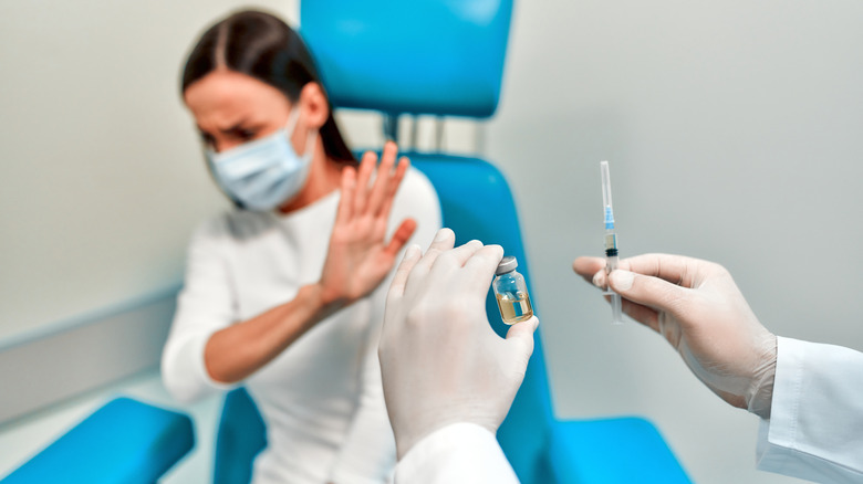 Woman fearing a vaccine