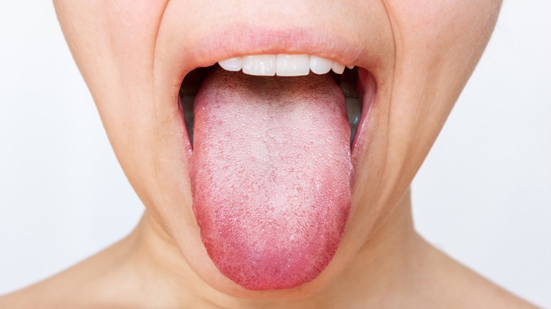 Person sticking tongue out