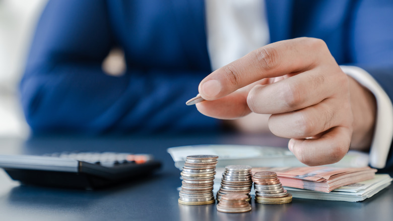 Holding a coin