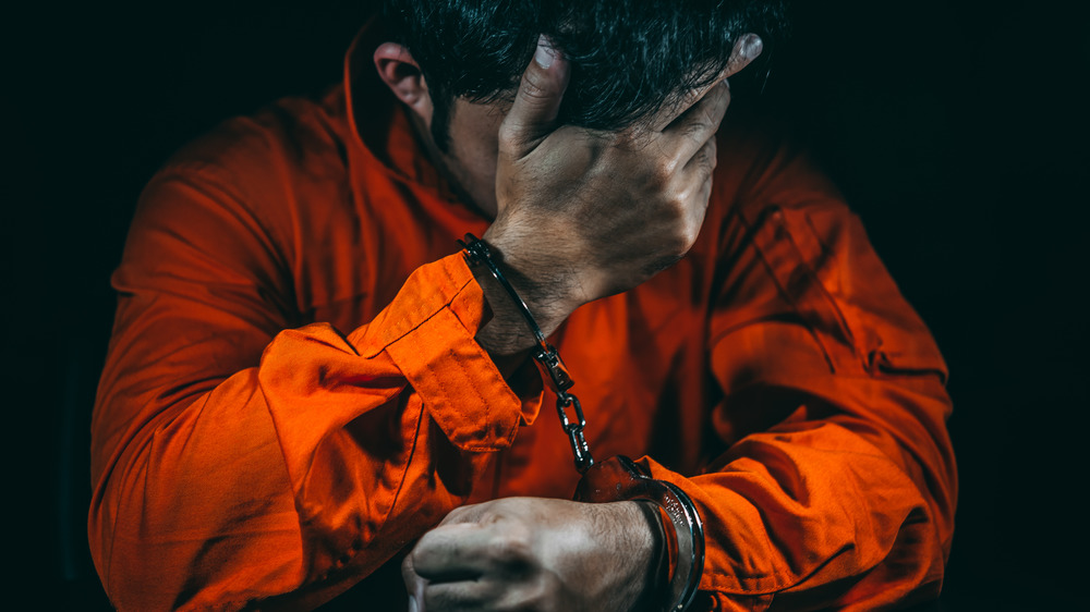 Handcuffed, incarcerated suspect