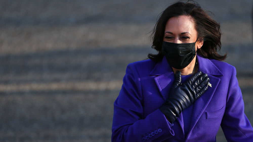 Kamala Harris with hand over heart 