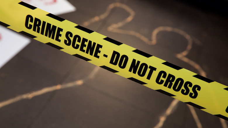 crime tape chalk outline