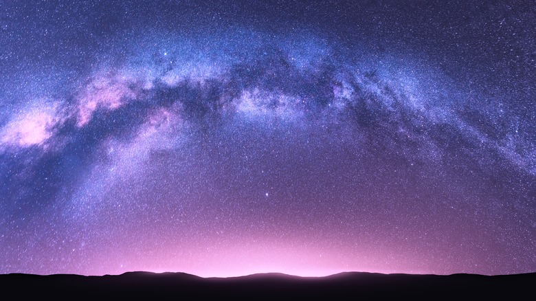 Milky Way over hills silhouette 