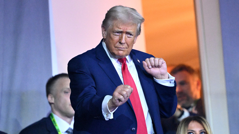 Donald Trump dancing with hands raised