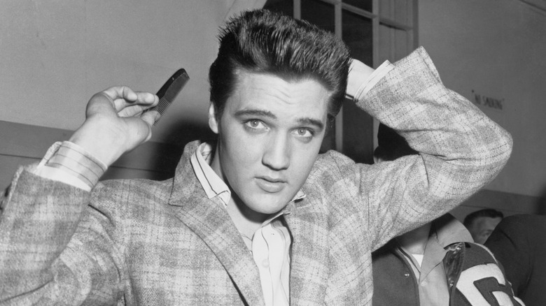 Elvis Presley combing hair