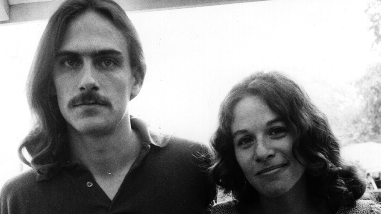 James Taylor and Carole King posing