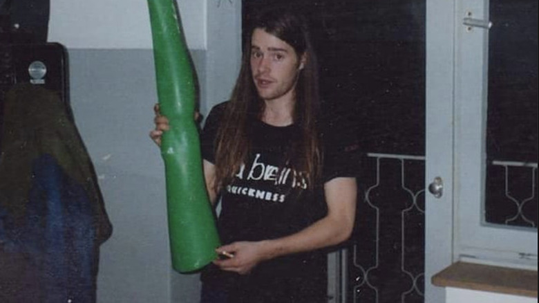 Chad Channing holding prosthetic leg