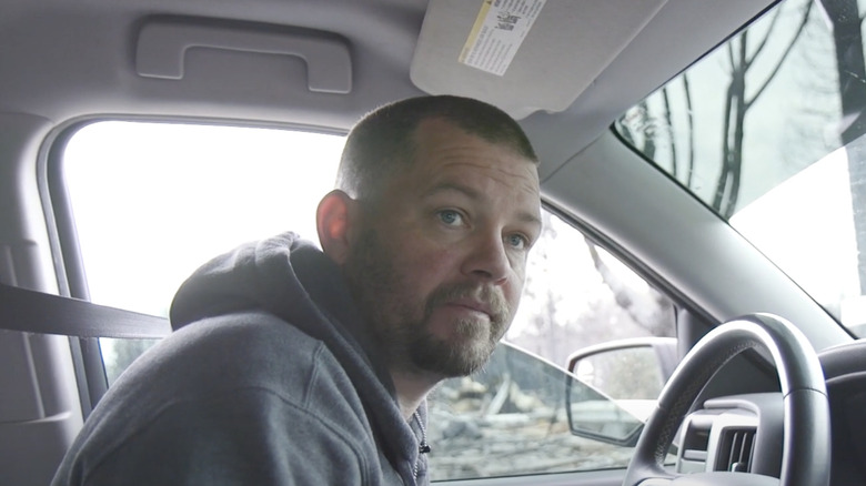 Stephen Murray looking out of truck