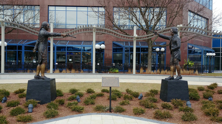 Statues showing the dual