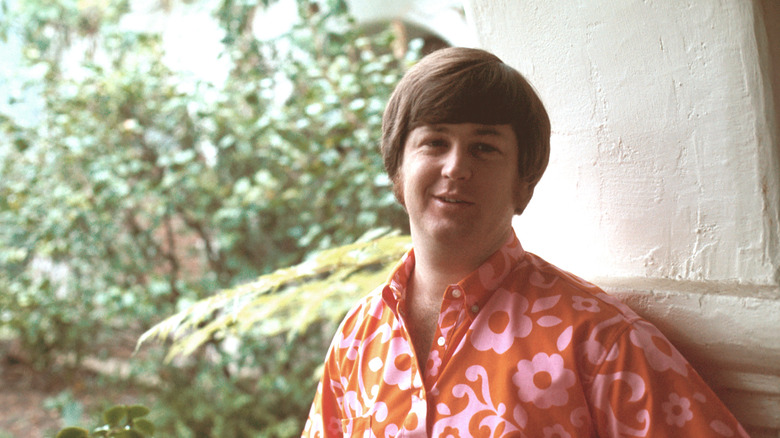 Brian Wilson posing in a Hawaiian shirt