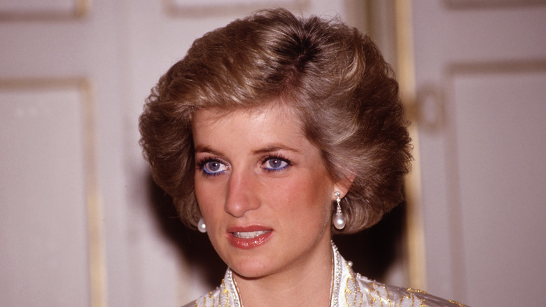 Princess Diana in white gown pearl earrings