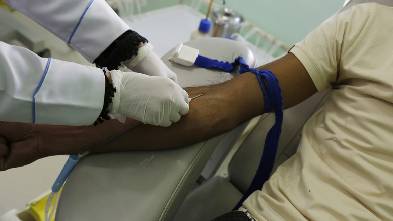 a person donating blood