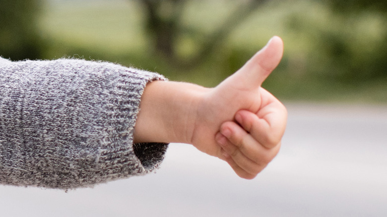 Child hitchhiking