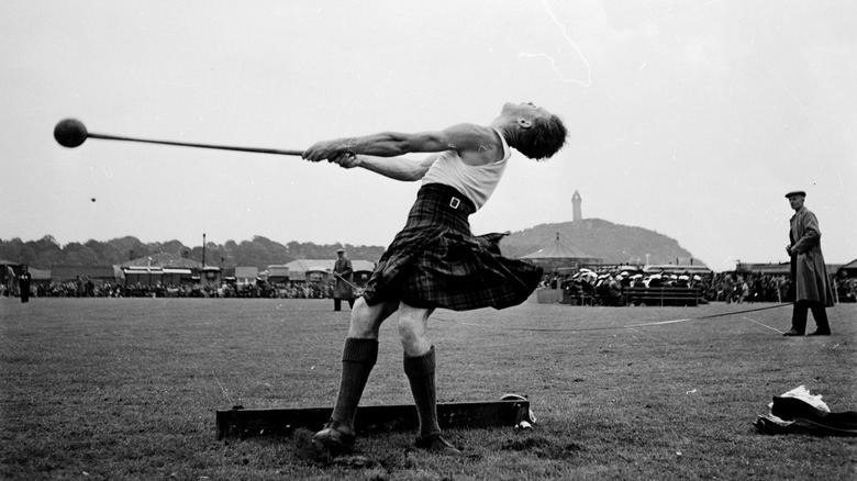 Man competing in Highland Games hammer throw