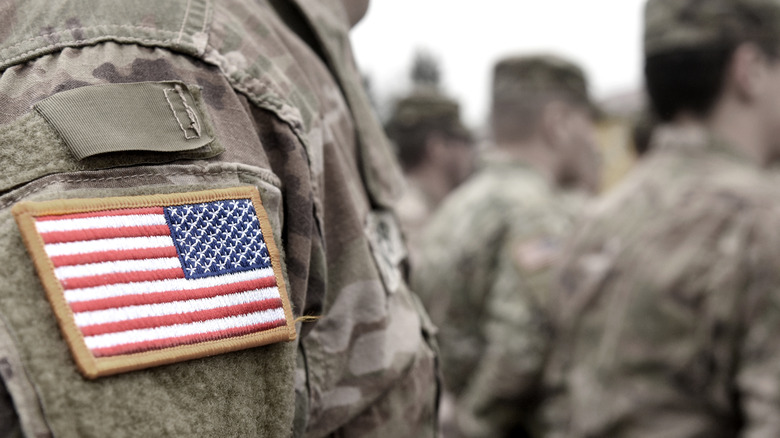 Soldier with a backward flag