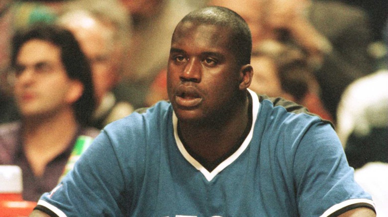 Shaquille O'Neal watching game from bench