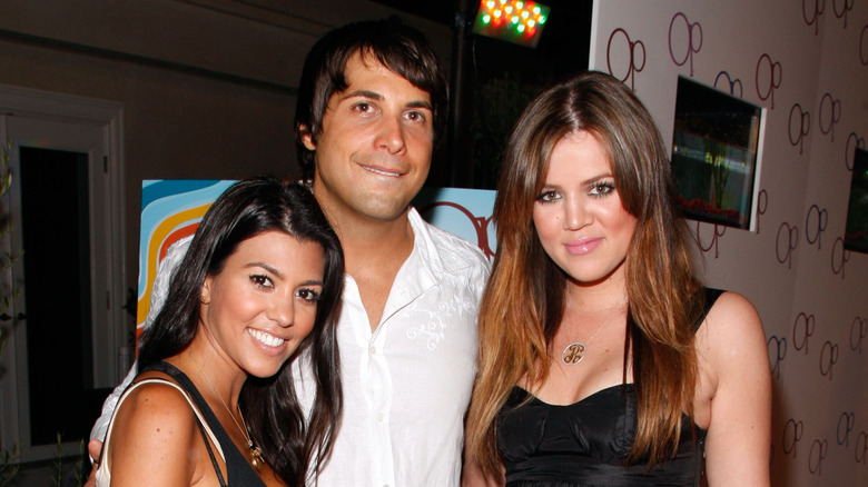 Joe Francis with Kourtney Kardashian and friend