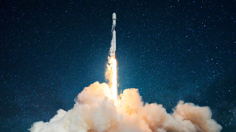 Rocket launch with a starry background