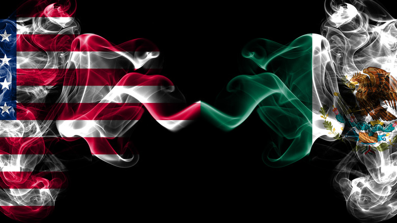 American and Mexican flags as smoke