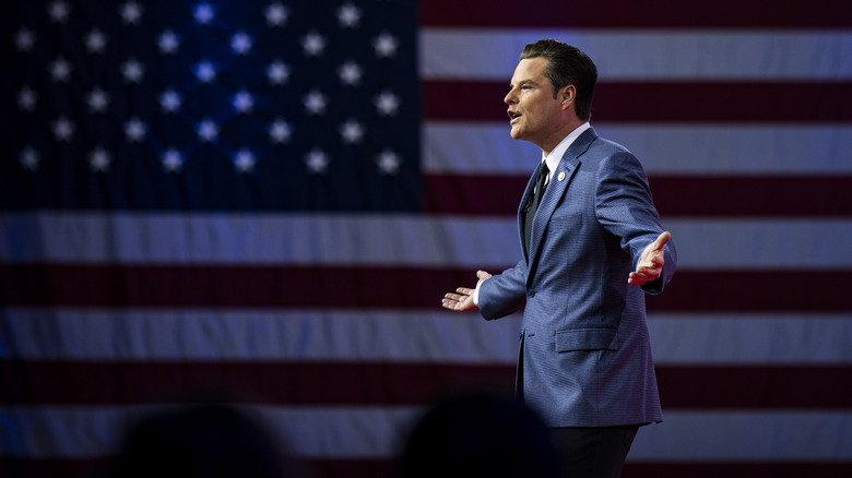 Matt Gaetz in front of an American flag