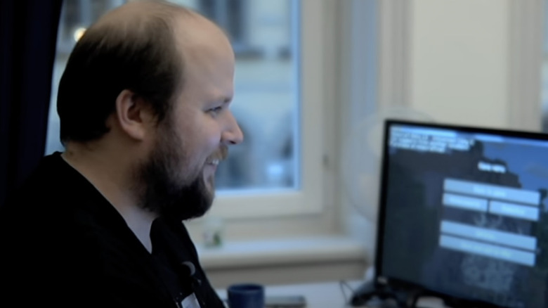 Markus Persson coding smiling