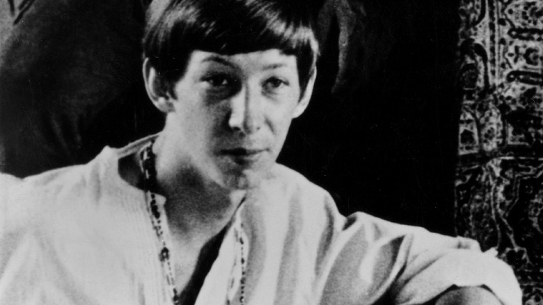 Bruce Palmer kneels in front of Buffalo Springfield