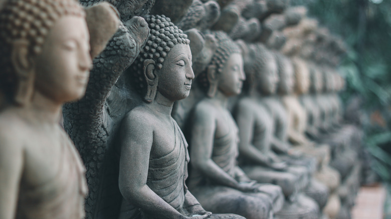 A row of Buddhist statues