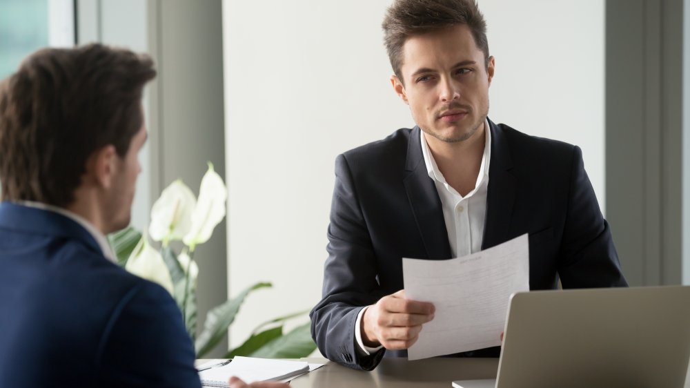 Distrustful-looking man in interview