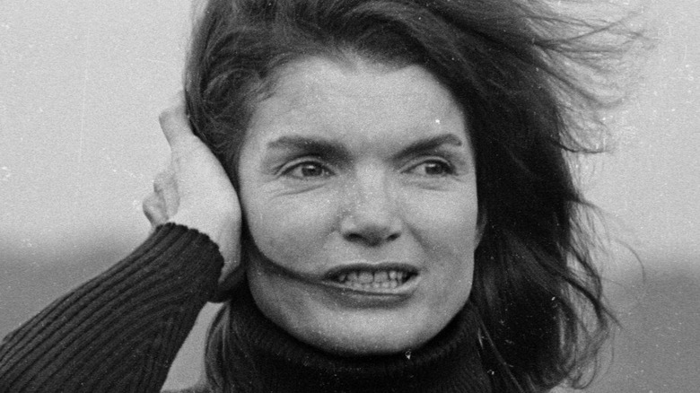  jackie kennedy holding back hair