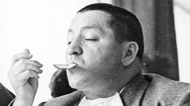 Curly Howard slurps soup