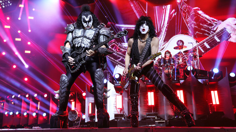 KISS's Gene Simmons and Paul Stanley playing on stage in 2023